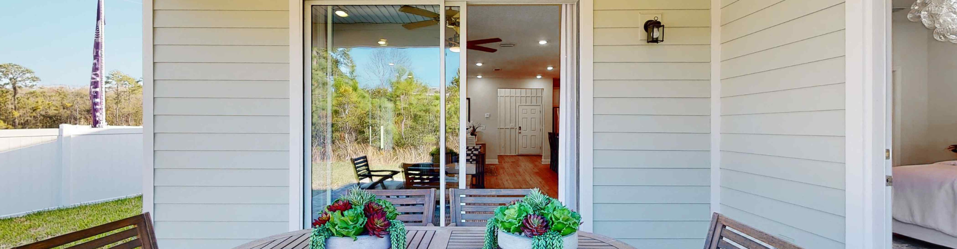 A room with a table and chairs.
