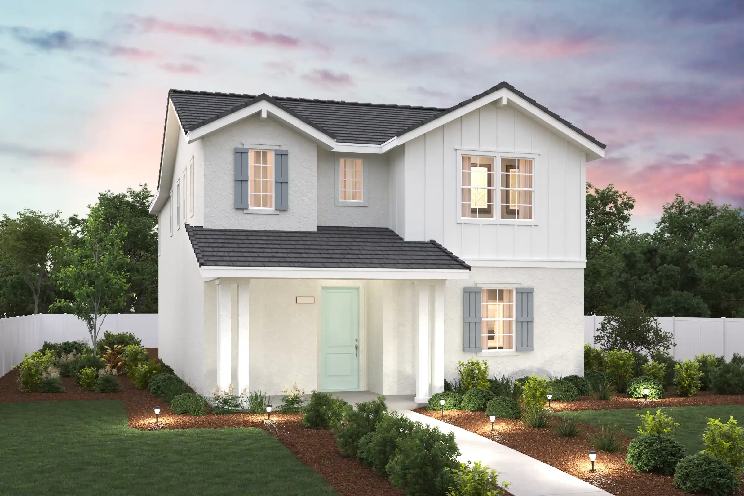 A white house with a driveway.