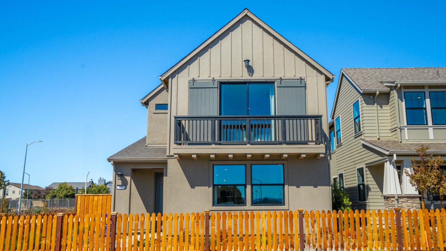 A house with a fence around it.