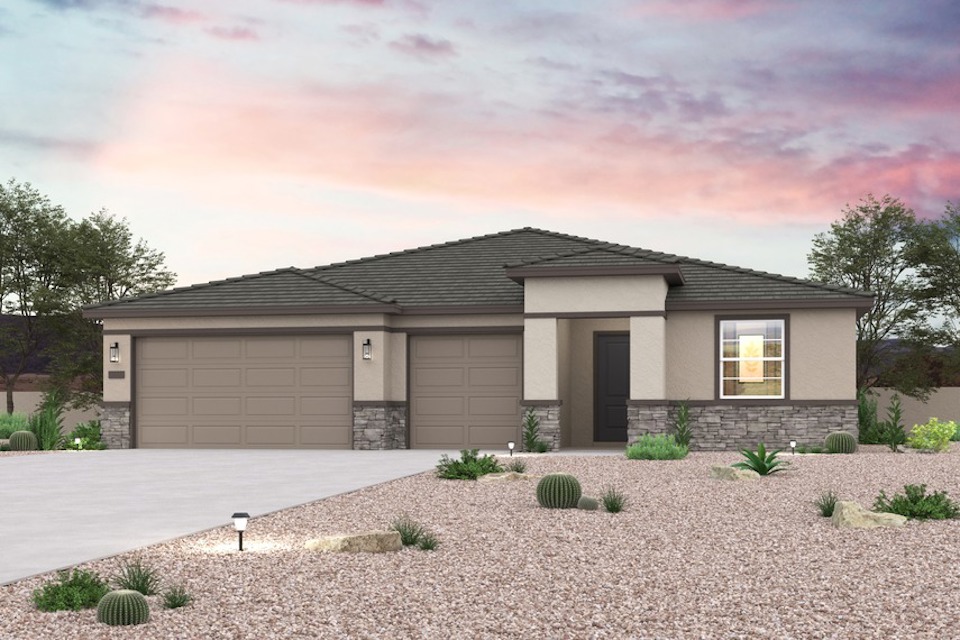 A house with a gravel driveway.