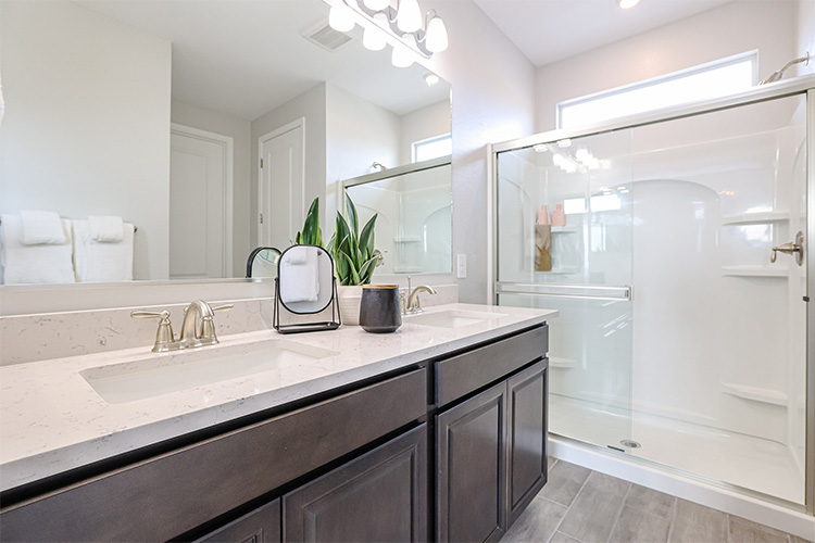 A bathroom with a glass shower.