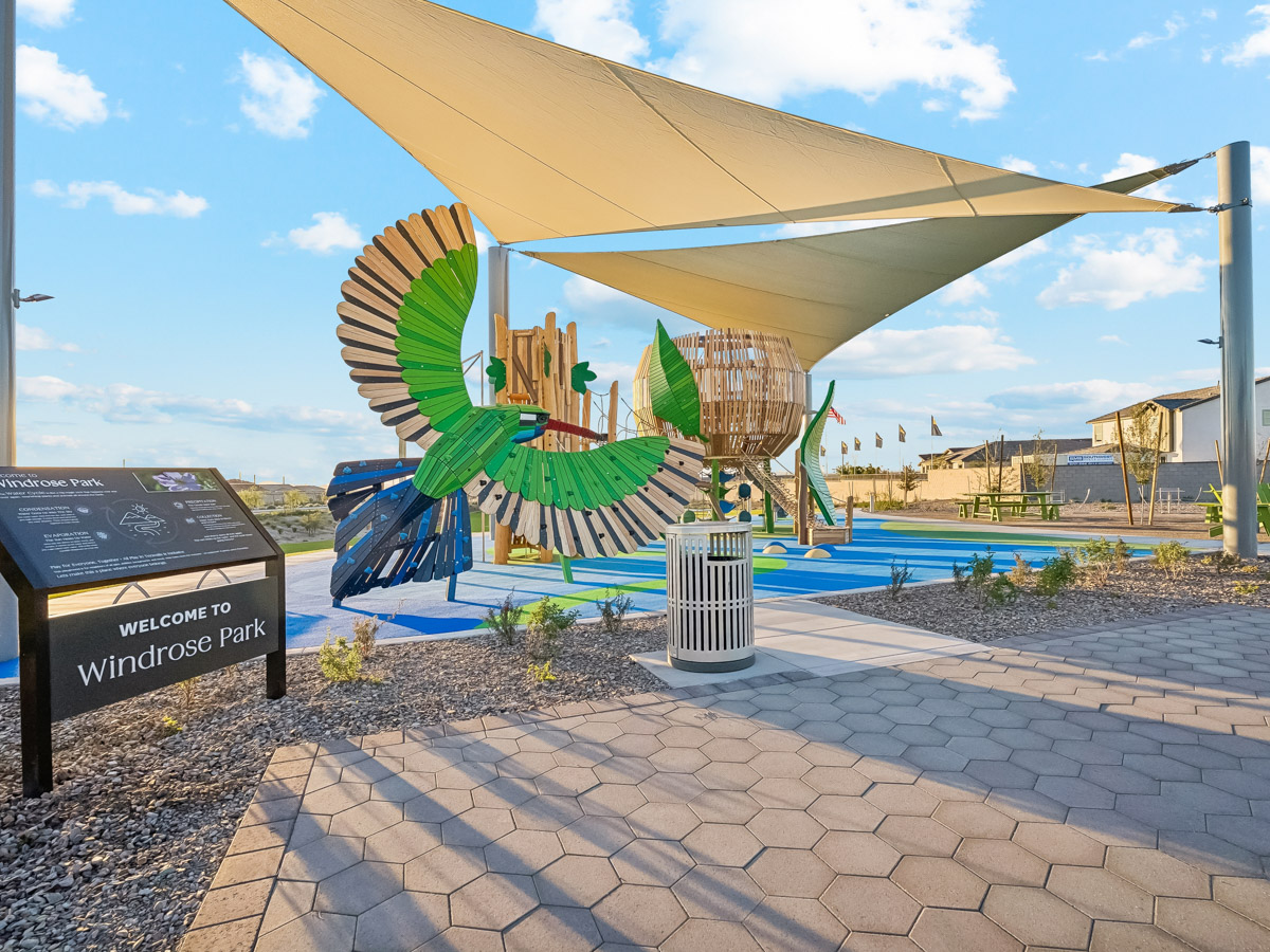 A large building with a large glass dome and a pool.