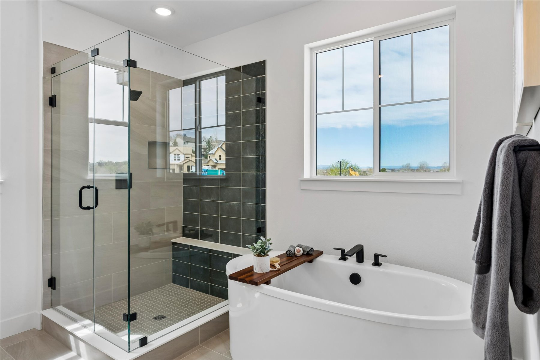 A bathroom with a glass shower.