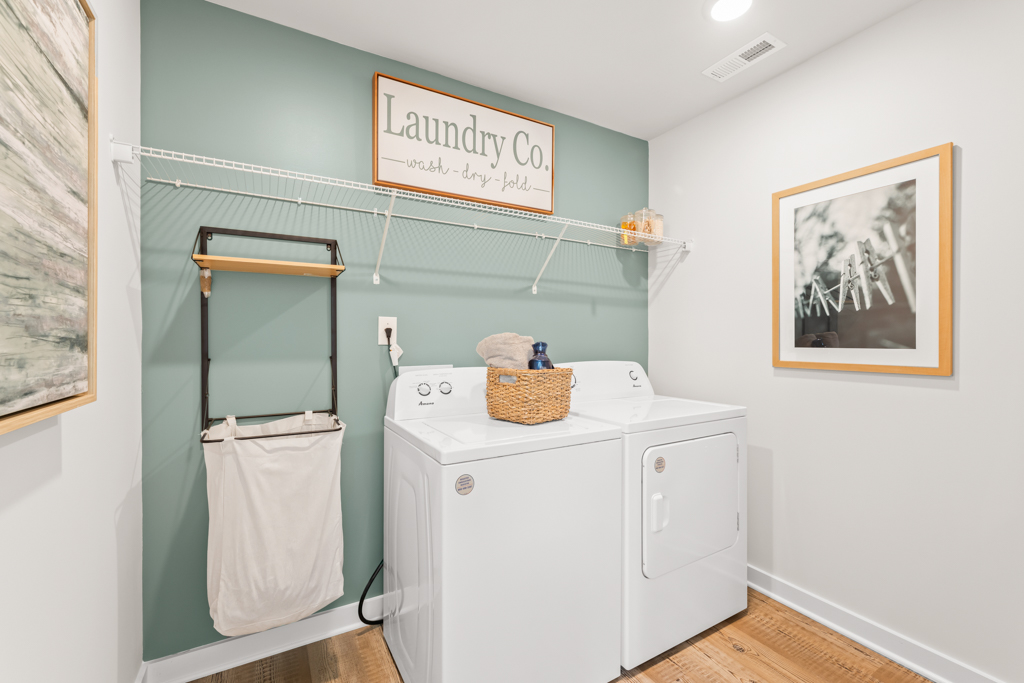 A laundry room with a washer and dryer.