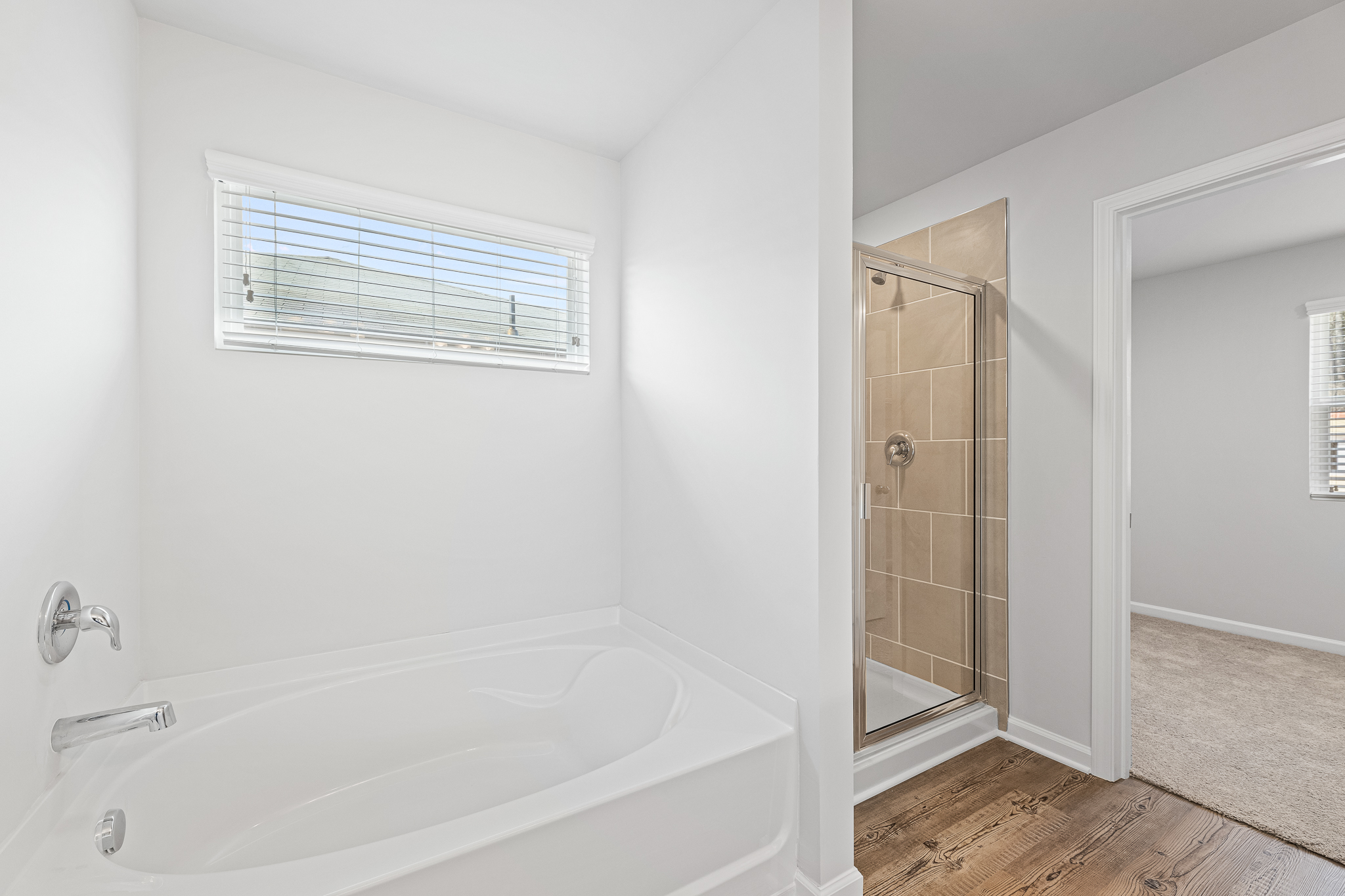 A bathroom with a glass shower.