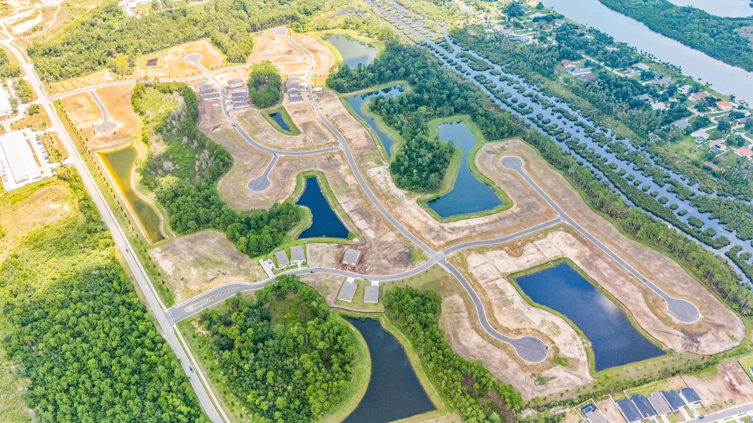 Reserve East by Century Communities in Flagler Beach Aerial View of Community with Roads and Available Homes