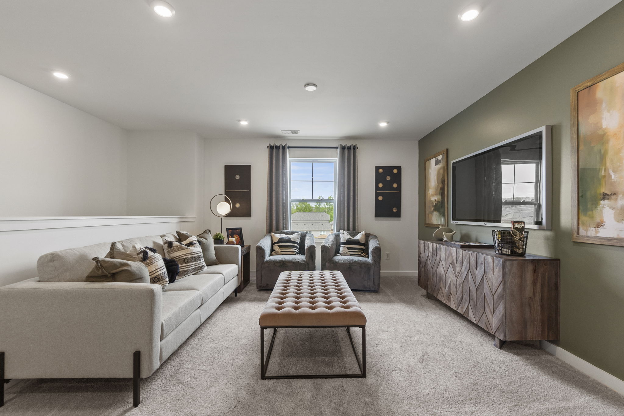 A living room with a couch and a coffee table.
