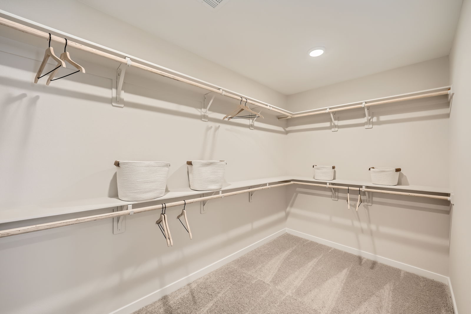 A bathroom with a tub and towels.