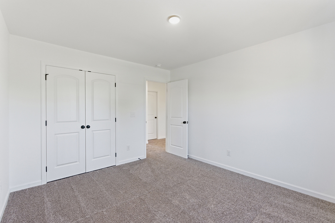 A room with white doors.
