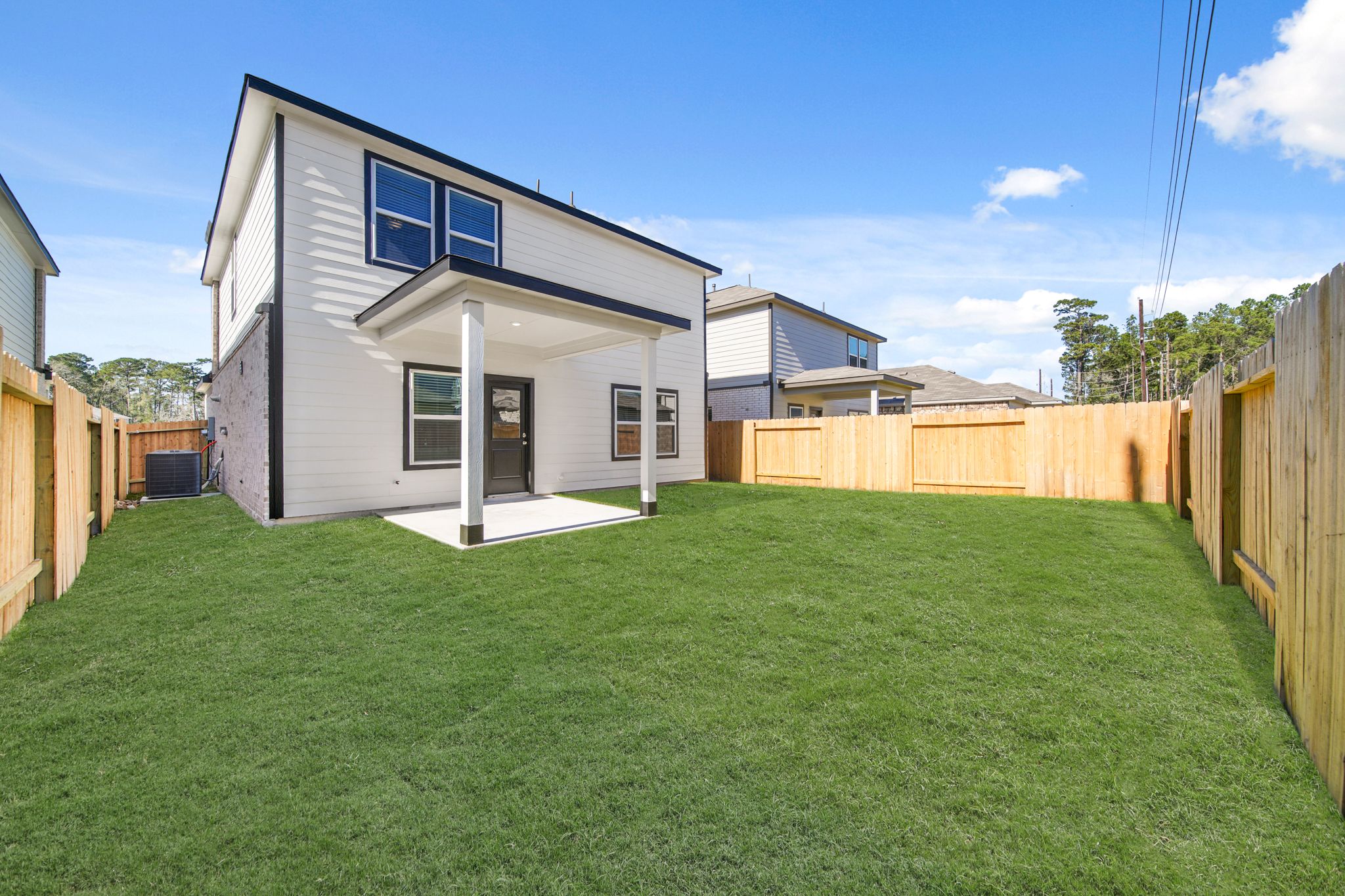 A house with a fence around it.