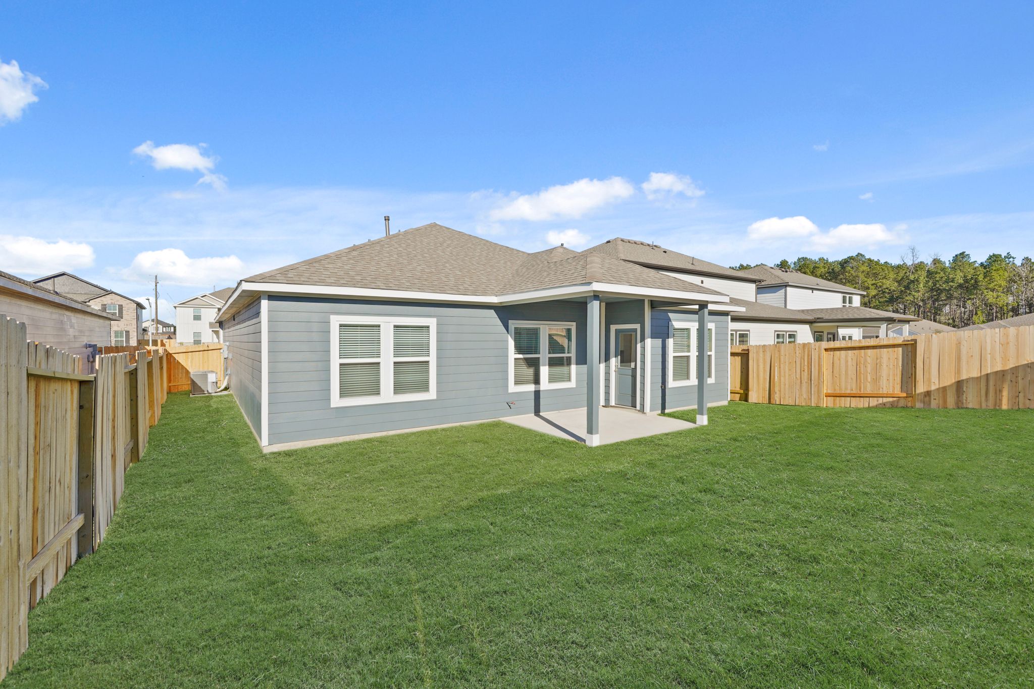 A house with a fence around it.