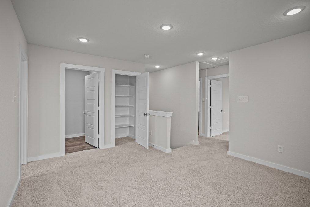 A room with white walls and a white floor.