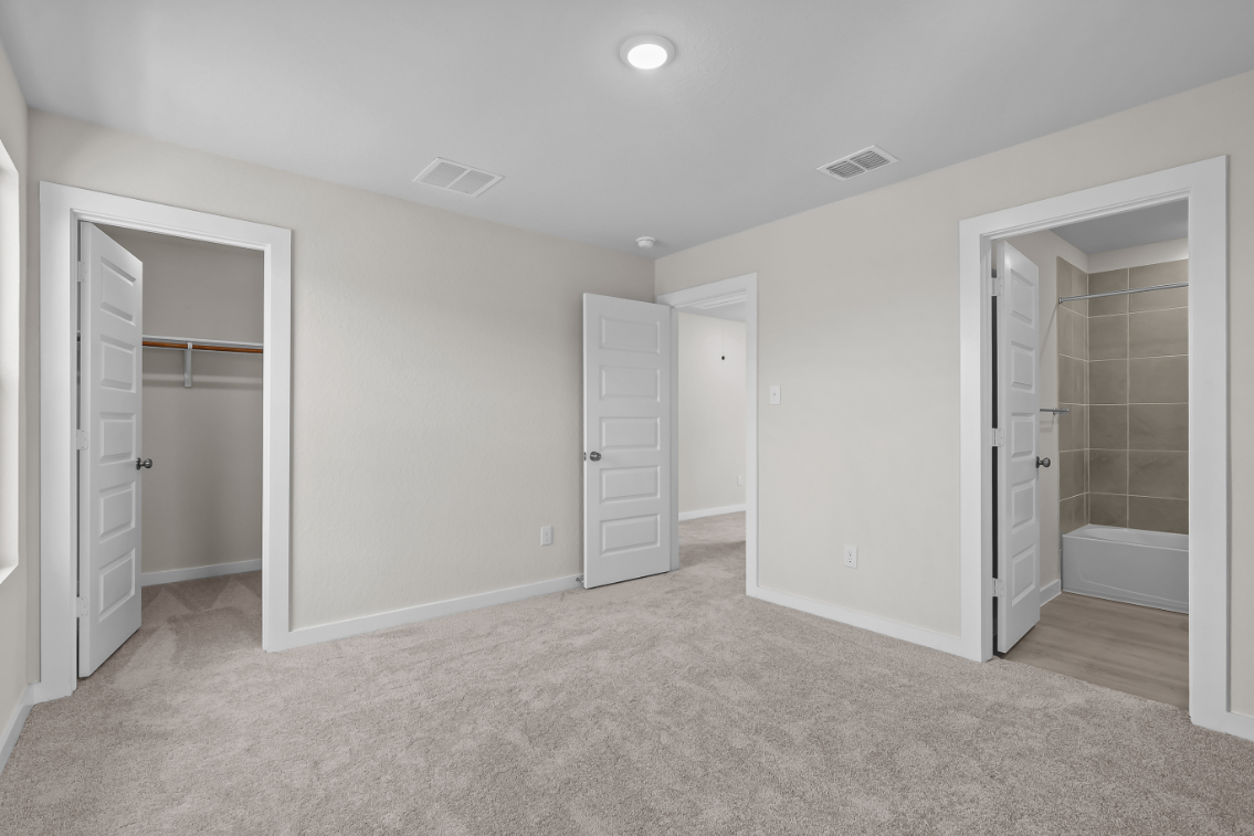 A room with white doors.