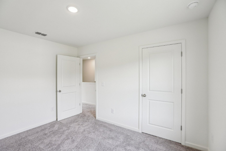 A room with white doors.