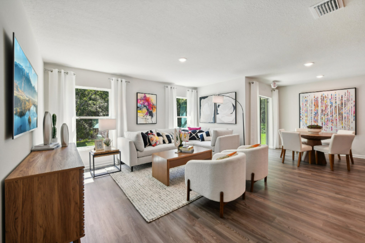 A living room with a wood floor.