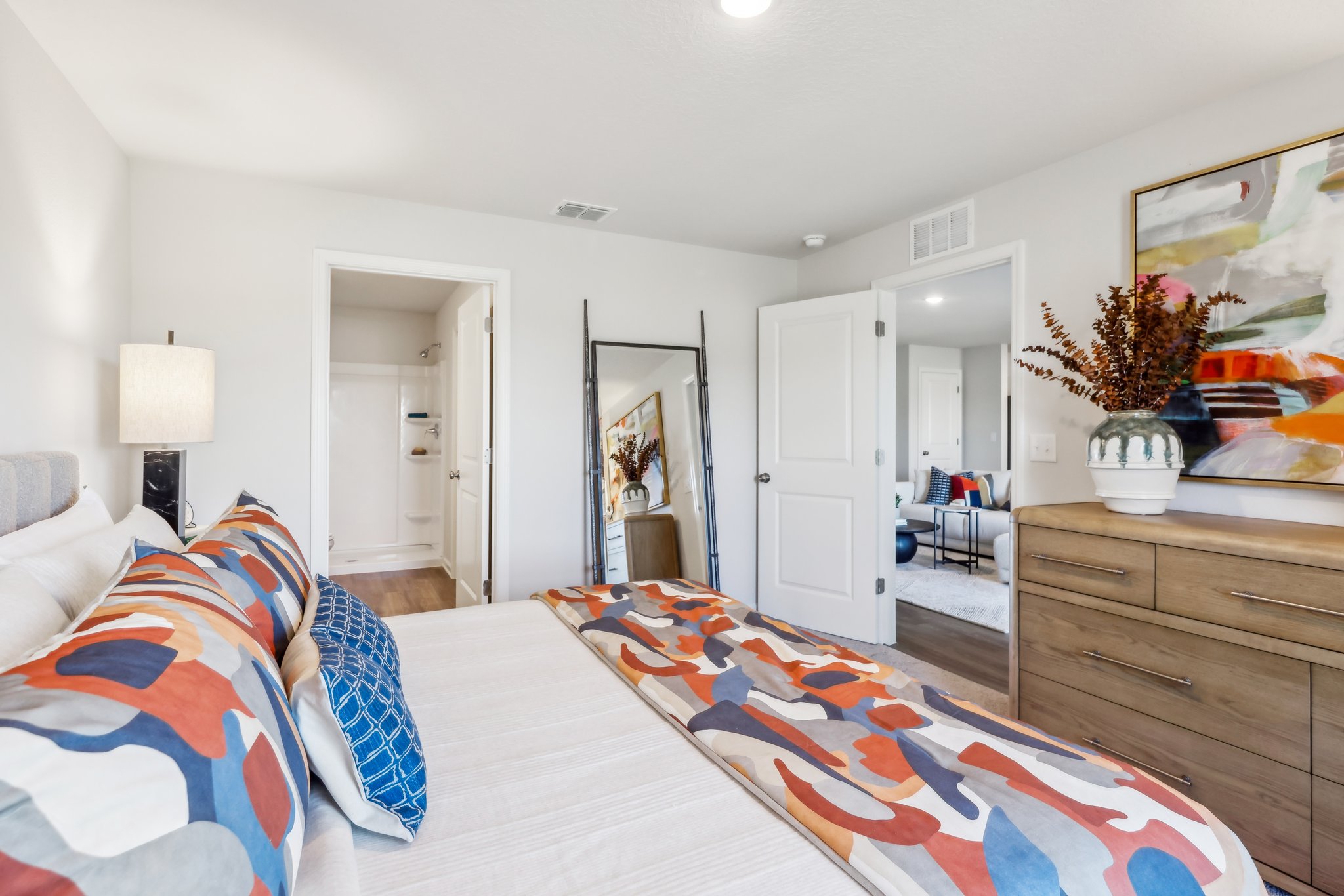 Owner&#x27;s suite with attached bathroom and walk-in closet.