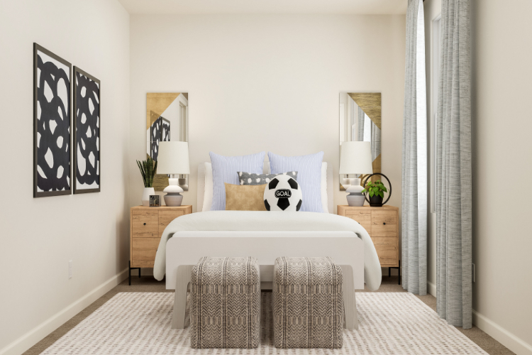 A bedroom with a bed and a chair.